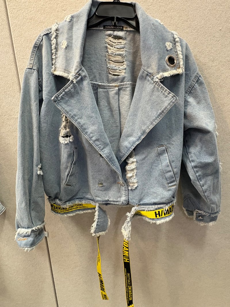 Distressed Denim Jacket with Yellow Accents