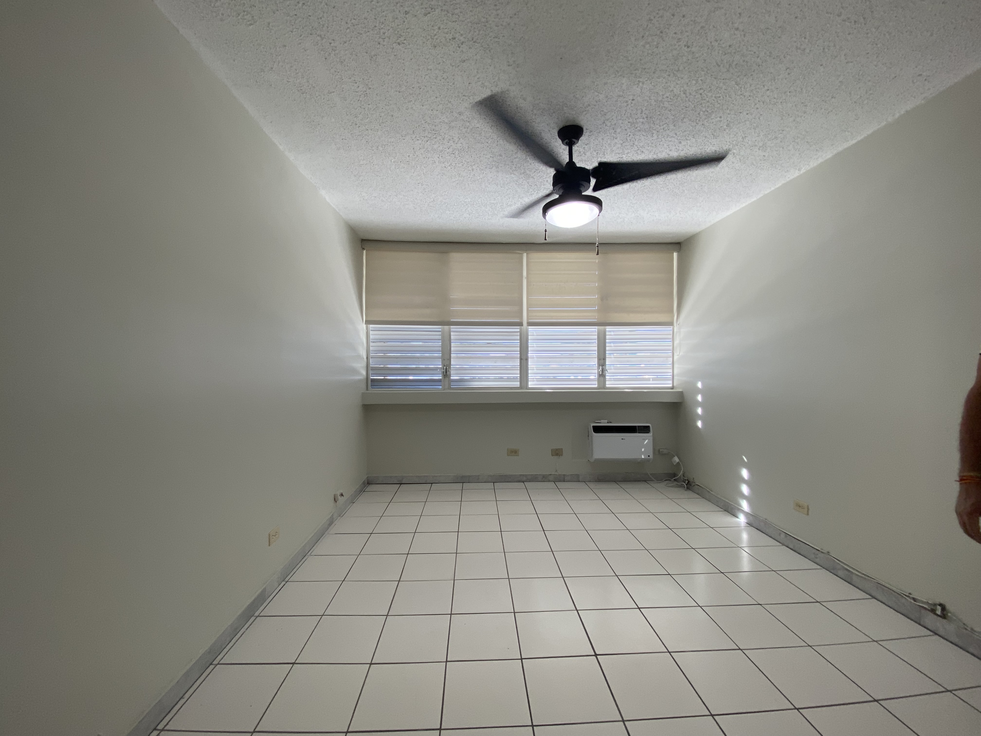Primary bedroom (10'5" x 12'1")